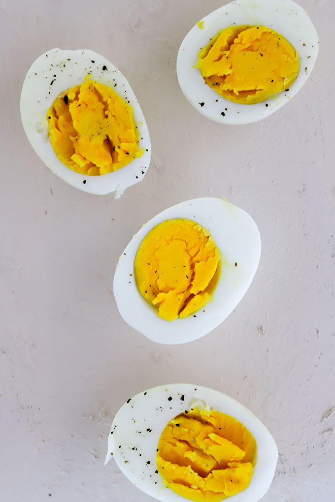 4 hard boiled eggs lined up in a row