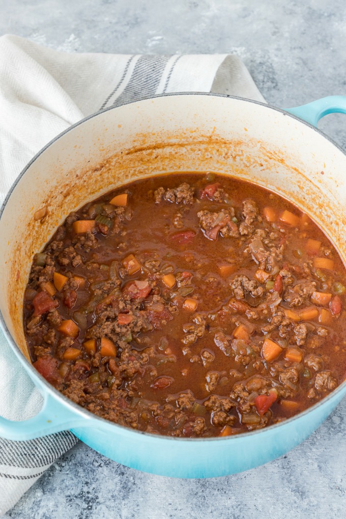 beef ragu in blue dutch oven