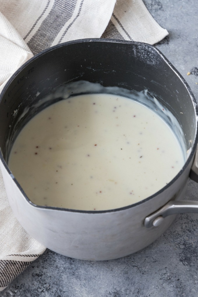 cheese sauce in saucepan