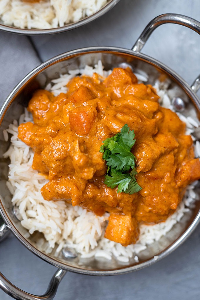 chicken massaman curry in copper dish