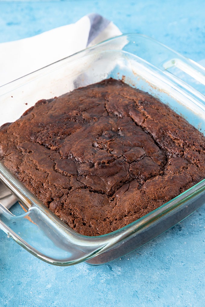 cooked chocolate self saucing pudding in dish