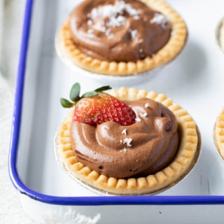 chocolate tartlets in enamel dish