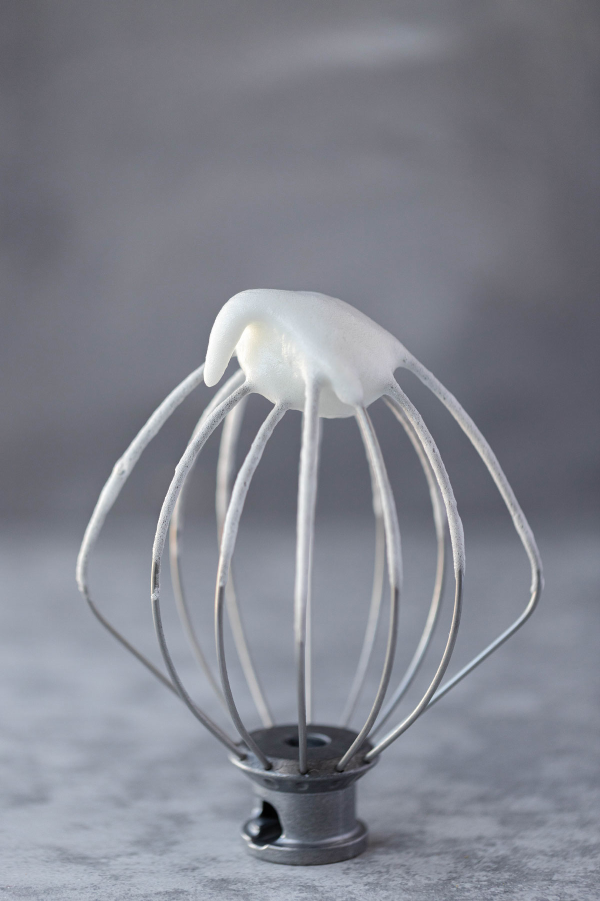 whisk with soft egg white peaks