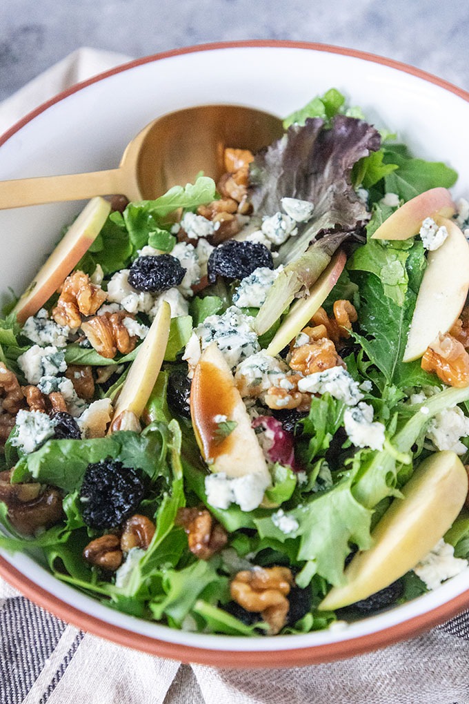 fall harvest salad in brown and white bowl