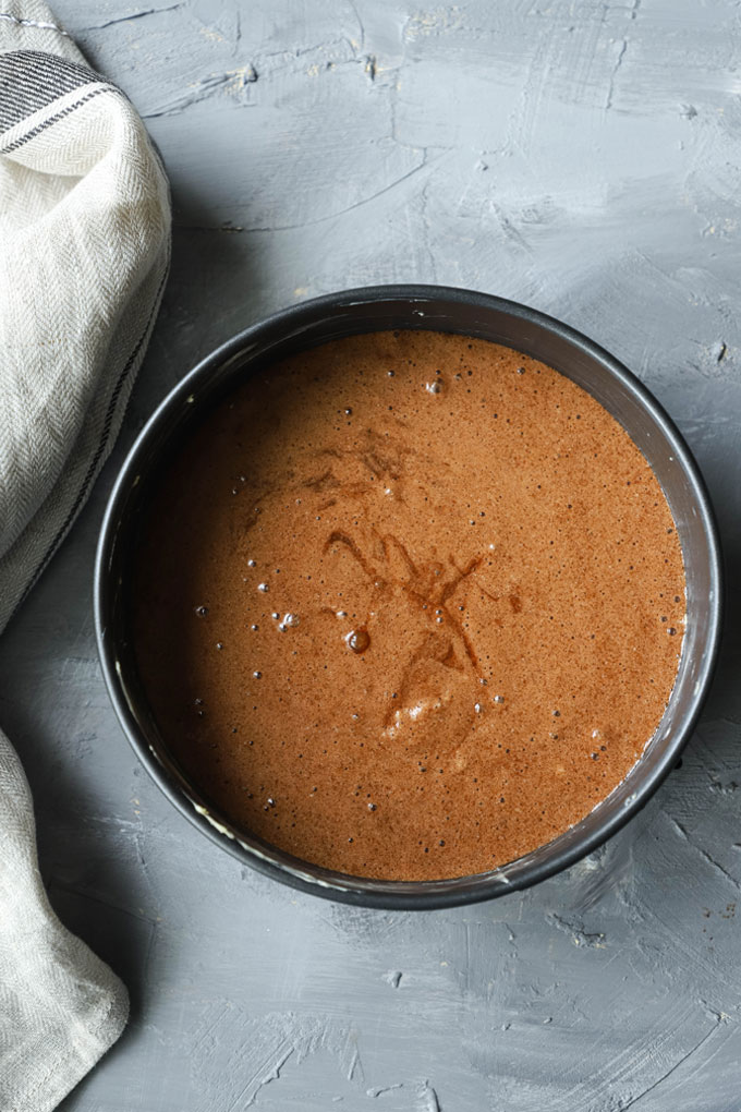 flourless chocolate torte batter in prepared tin