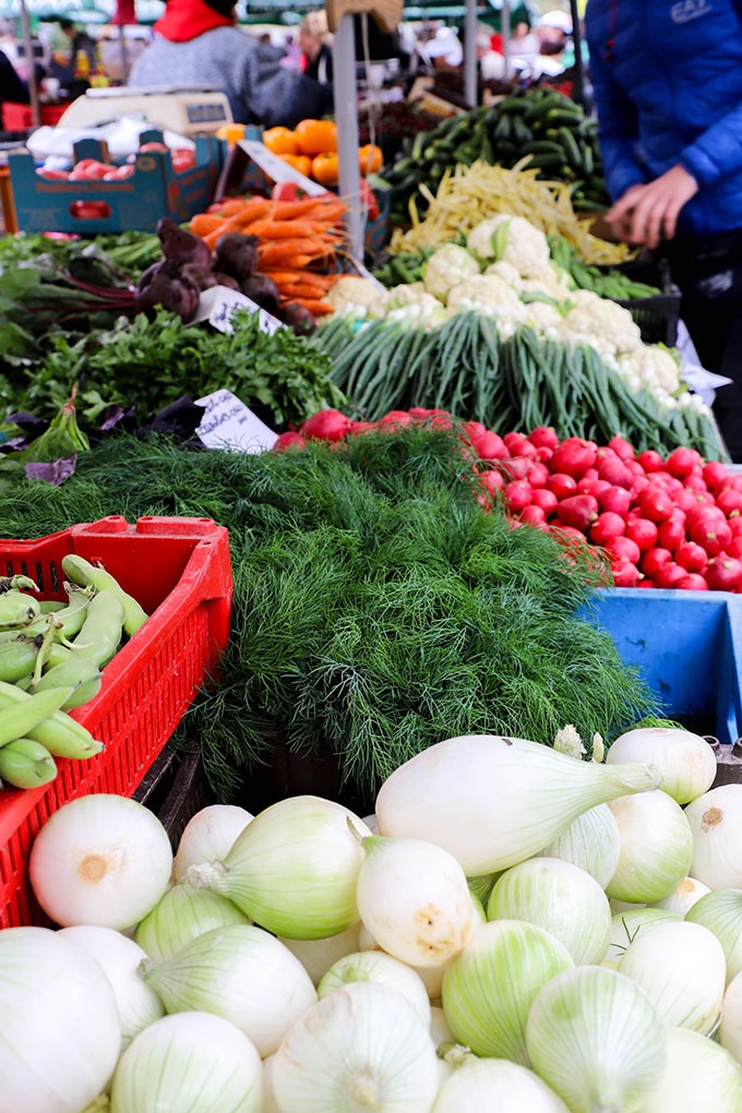 food in riga markets - dill, onions and radishes