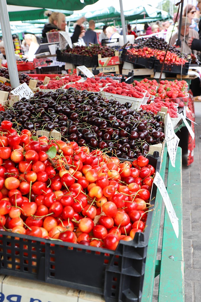 piles of cherries at the riga central market