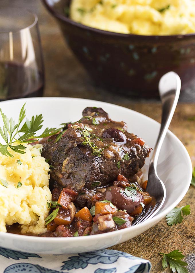 French short ribs with mash in white bowl