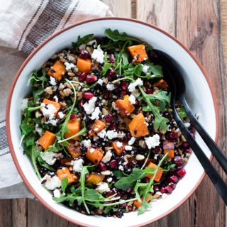 grain salad in white and brown bowl