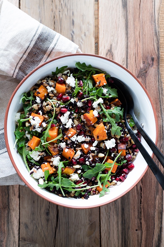 grain salad in white and brown bowl