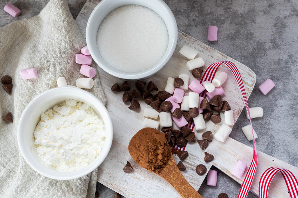 hot chocolate recipe ingredients on flat board