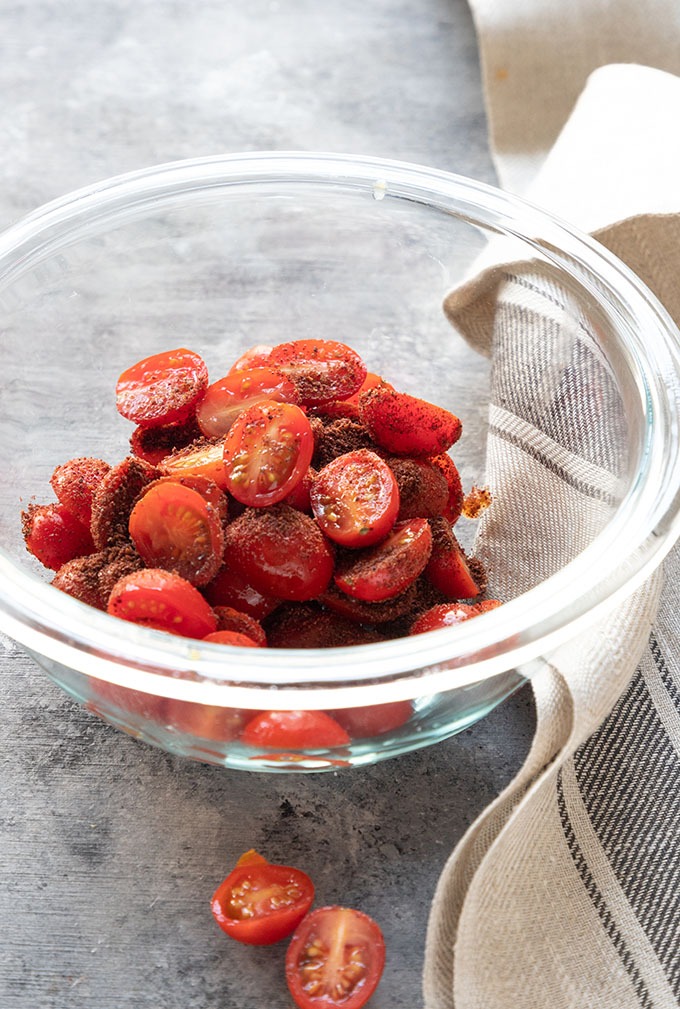 tomatoes, lemon and sumac in clear bowl