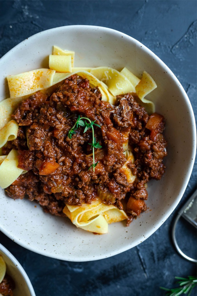 close up lamb ragu in bowl 