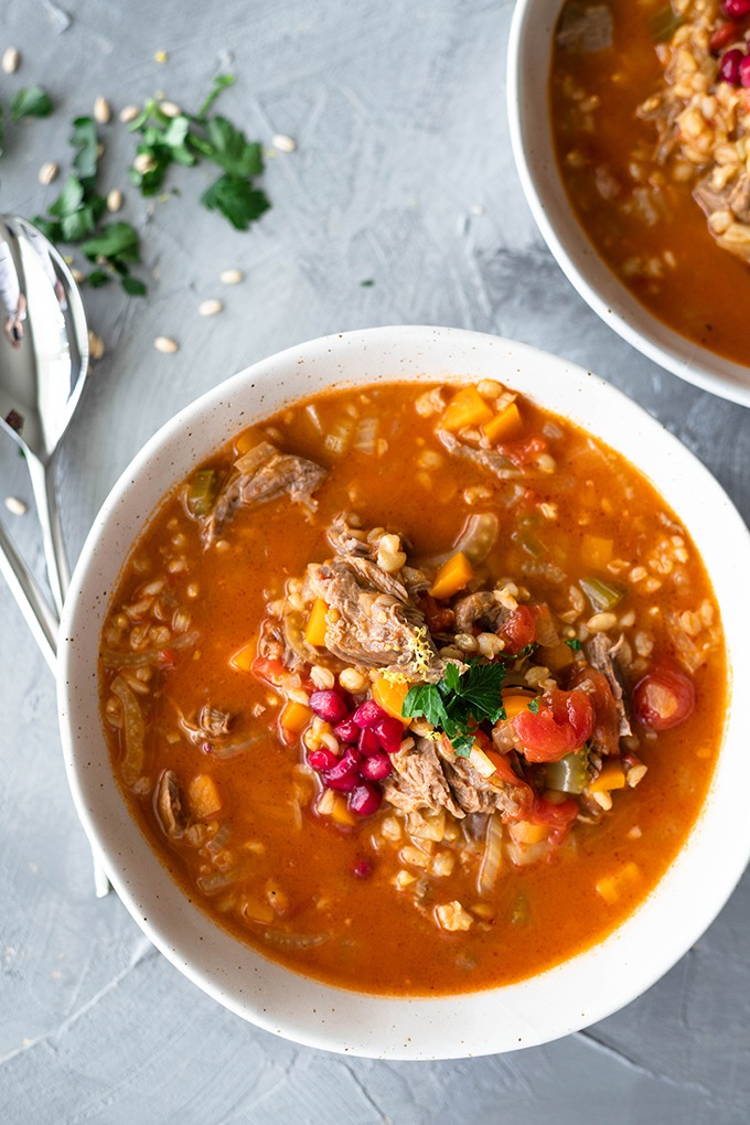 lamb shank soup in large bowl 