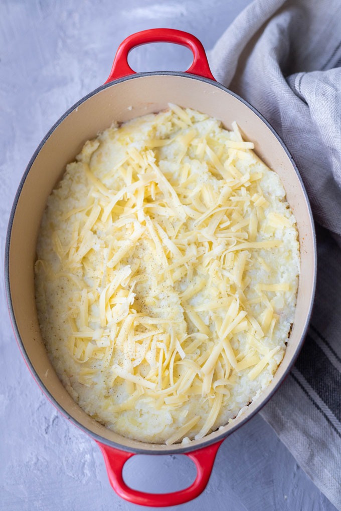 lamb shepherd's pie uncooked in red dutch oven