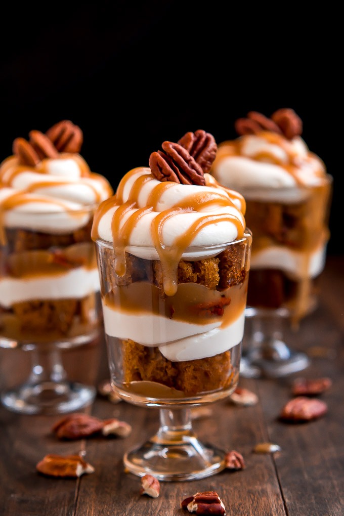 caramel pecan pumpkin cheesecake on wooden board