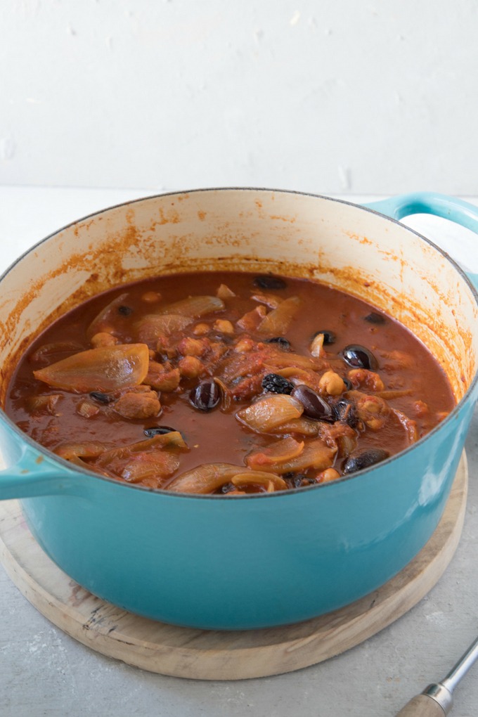 moroccan chicken stew in blue Dutch Oven