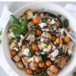 pinterest graphic - bowl of panzanella salad with 'panzanella salad recipe' text on white banner top of image