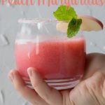 pinterest graphic of peach margaritas - hand holding peach margarita