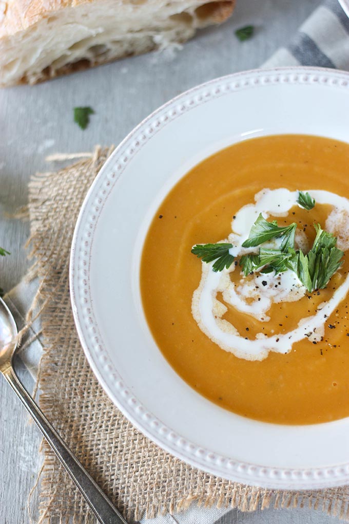 bowl of sweet potato pumpkin soup on hessian square