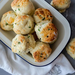 overhead of savoury scones in enamel dish