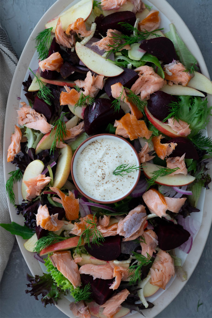 smoked salmon salad on large white platter