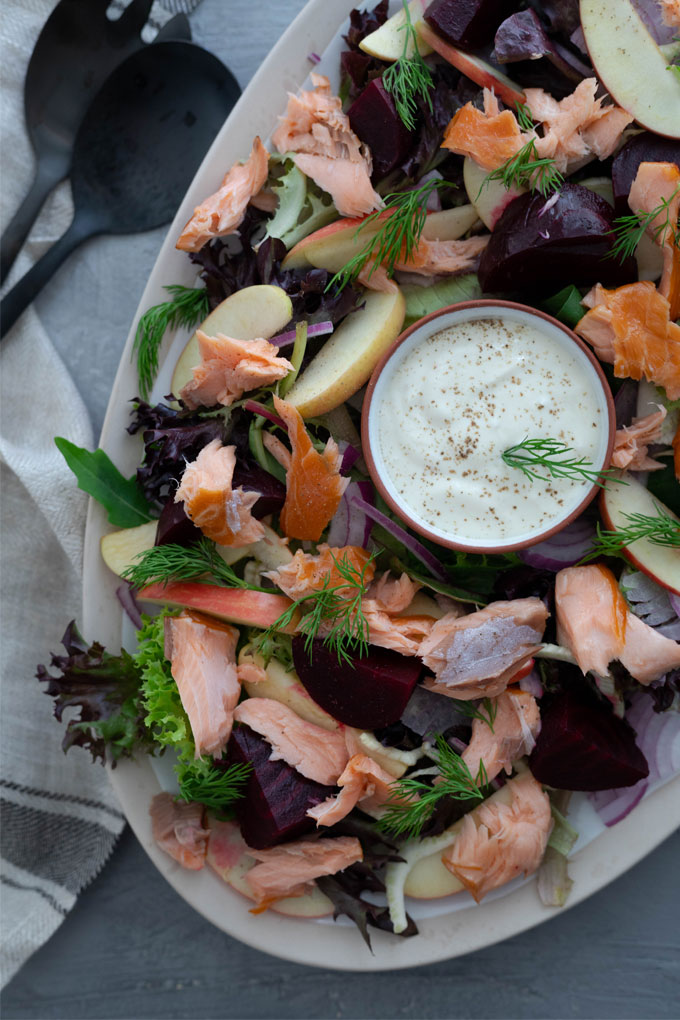 close up smoked salmon salad on large platter