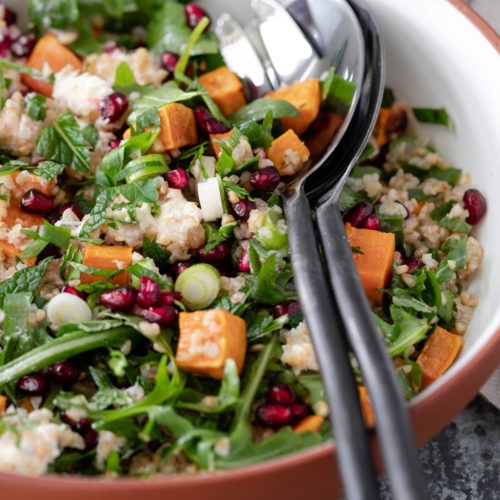 sweet potato salad in a bowl with servers