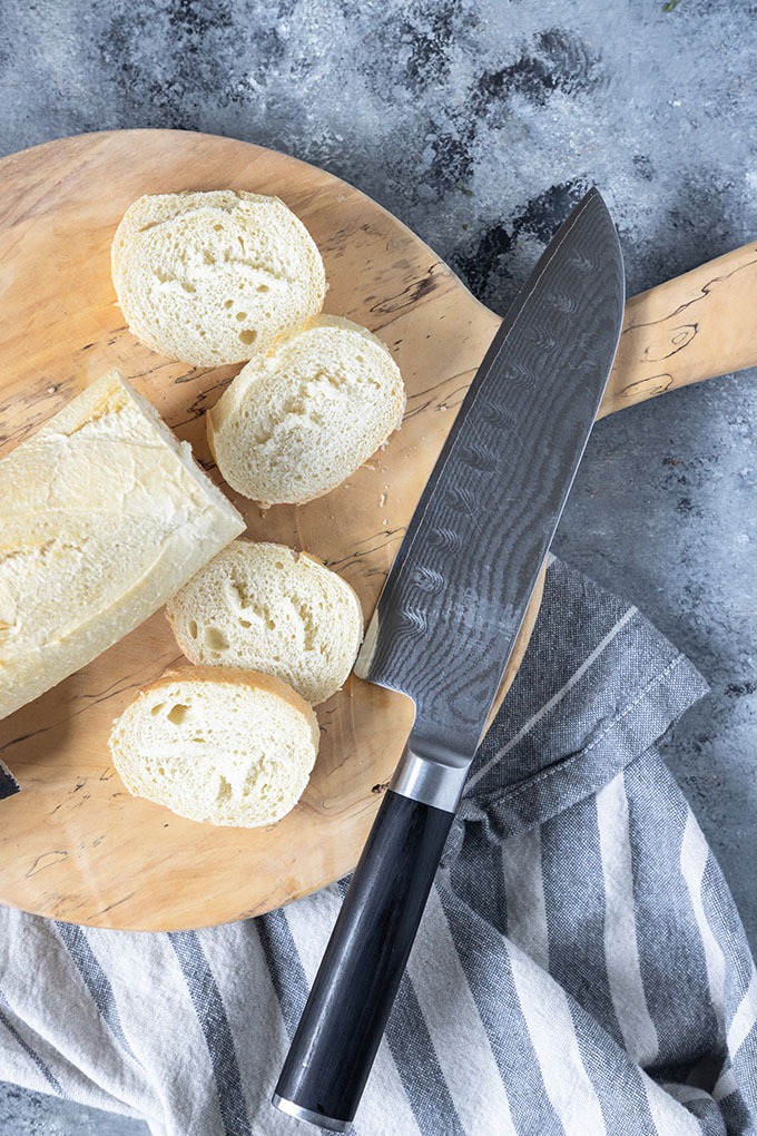 bread cut on wooden board